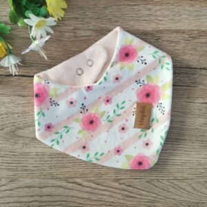 Nepremočljivi slinče Rože na marelično roza črtah Hopka