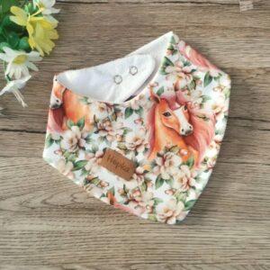 Nepremočljivi slinček Konji med cvetjem Hopka