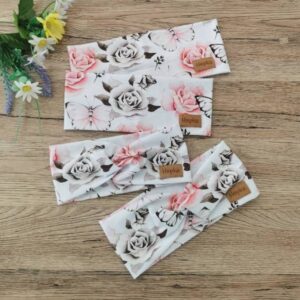 Naglavni trak Vrtnice z metulji na beli Hopka